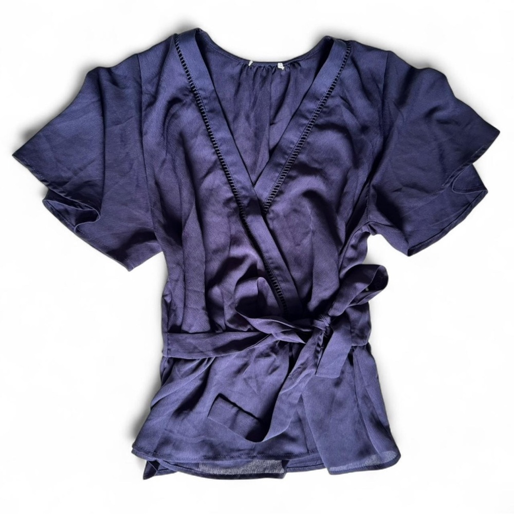 Navy blue short sleeve blouse with tie bow detail at waist